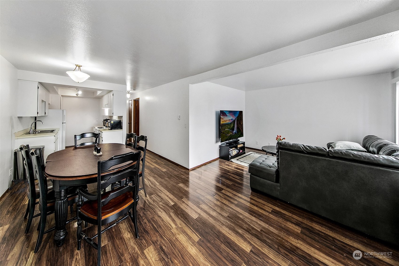 1015 Southwest 149th Street Burien, WA 98166 - Photo 13 of 31 a living room with furniture and wooden floor