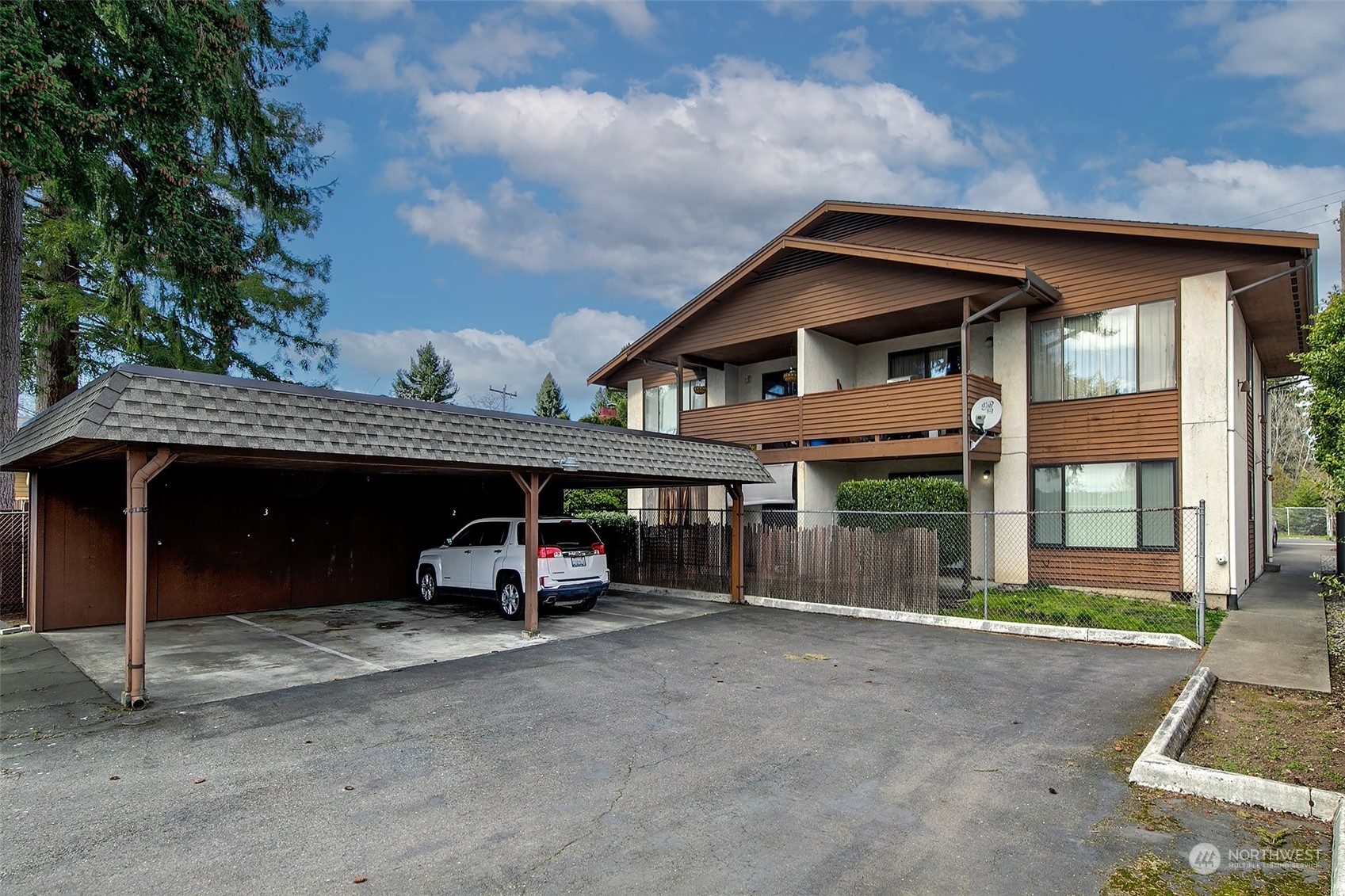 1015 Southwest 149th Street Burien, WA 98166 - Photo 5 of 31 a view of a house with a patio and a yard