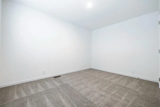 an empty room with an entryway