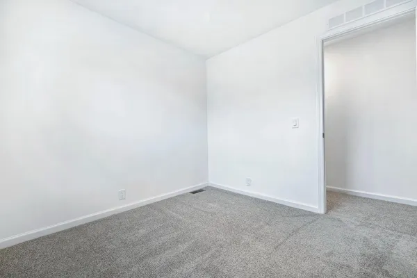 a view of a hallway with closet