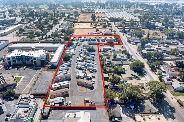 a front view of a house with parking