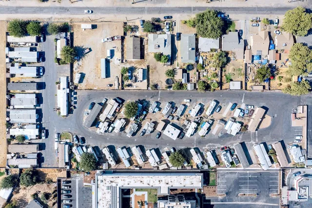 a view of a street with cars