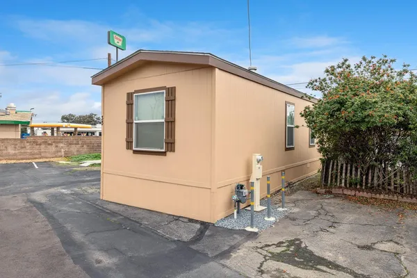 a front view of a house with a garage
