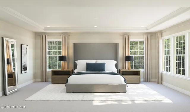 a bedroom with a large bed and a large window