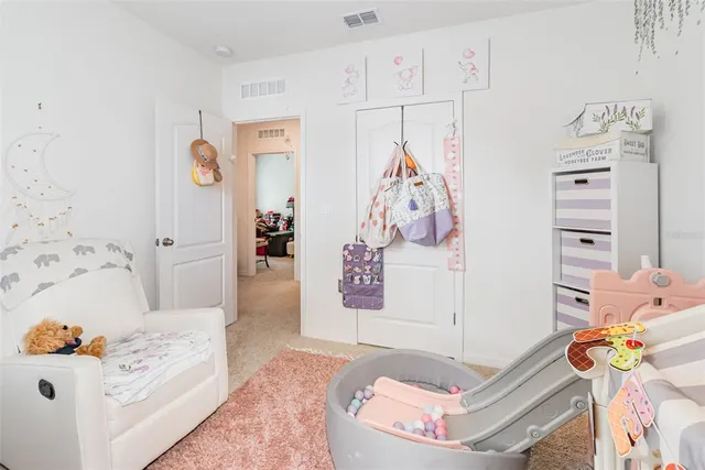 a living room with furniture and decor