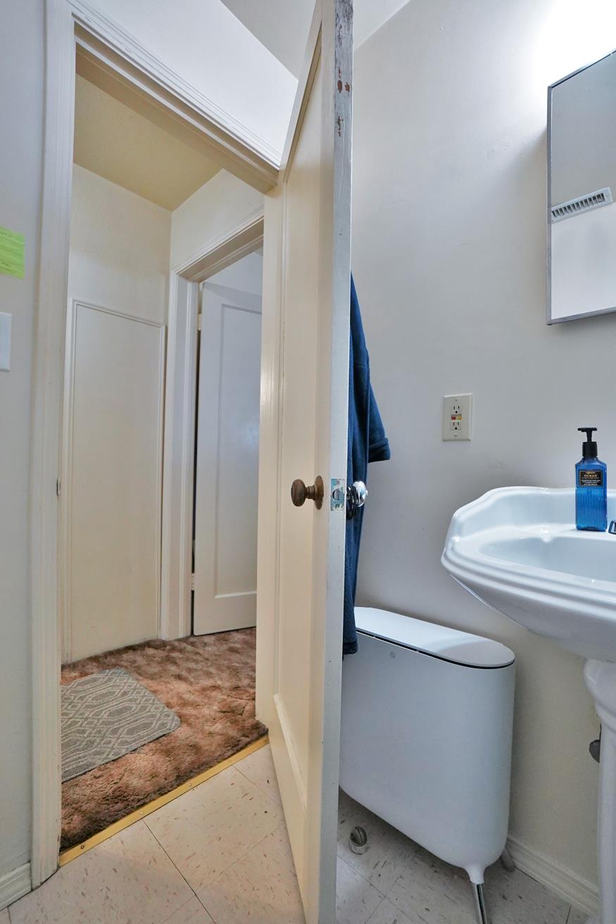 605 East Myrtle Street Hanford, CA 93230 - Photo 9 of 17 a bathroom with a sink and a toilet
