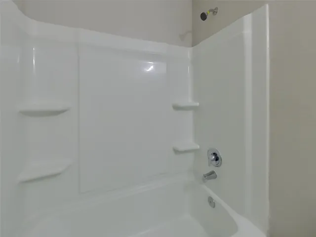 a close up of a bathtub