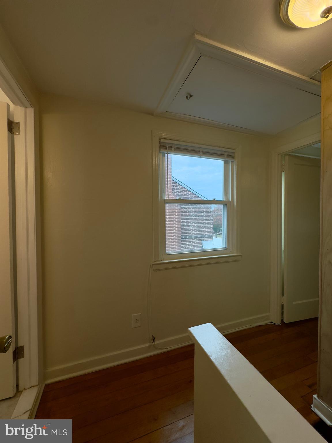 116 Carver Road Dundalk, MD 21222 - Photo 11 of 19 a room with a wooden floor and a window