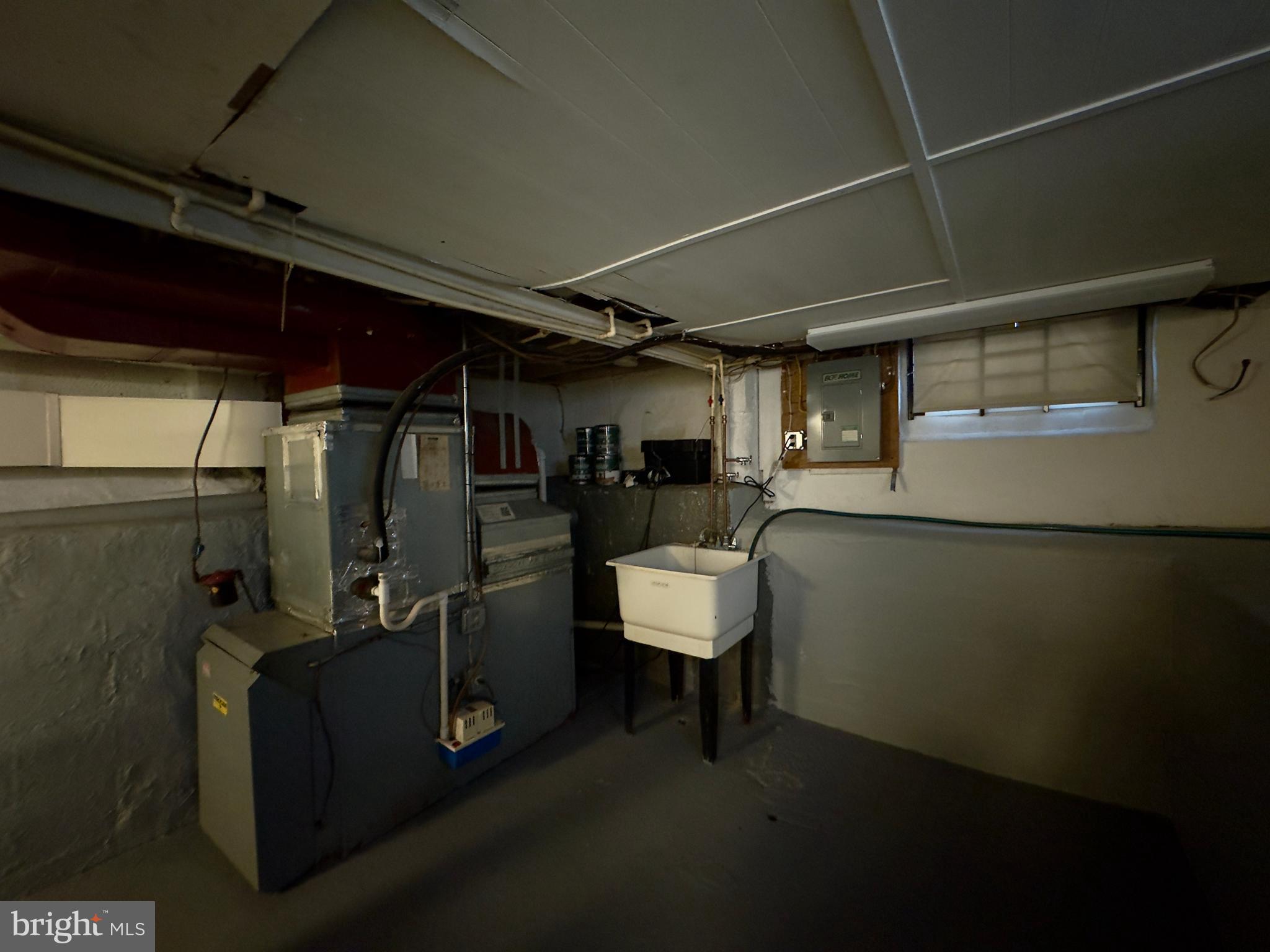 116 Carver Road Dundalk, MD 21222 - Photo 18 of 19 a utility room with dryer and washer