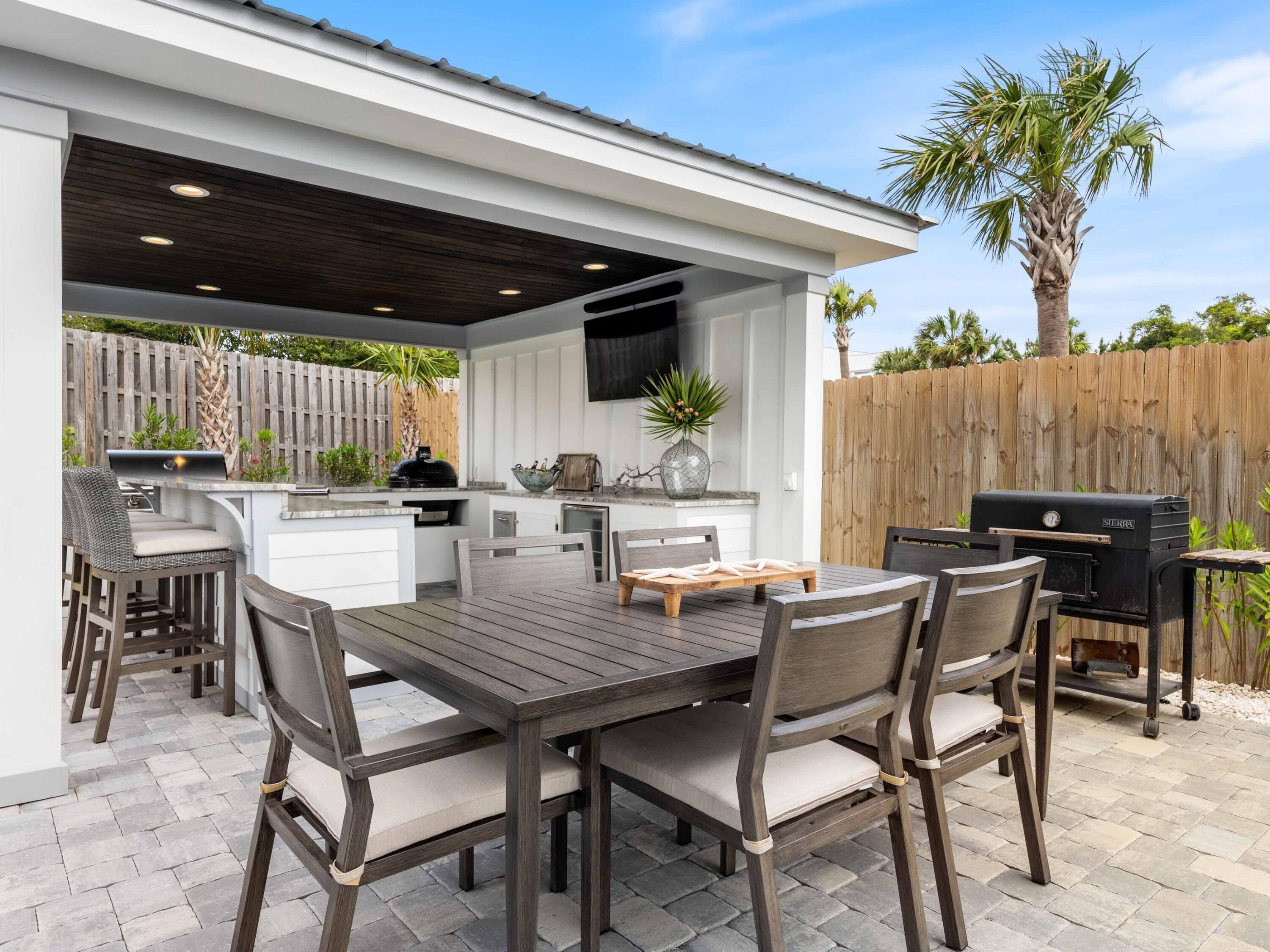 102 Overlook Circle Miramar Beach, FL 32550 - Photo 14 of 38 a view of a dinning table and chairs in patio of the house