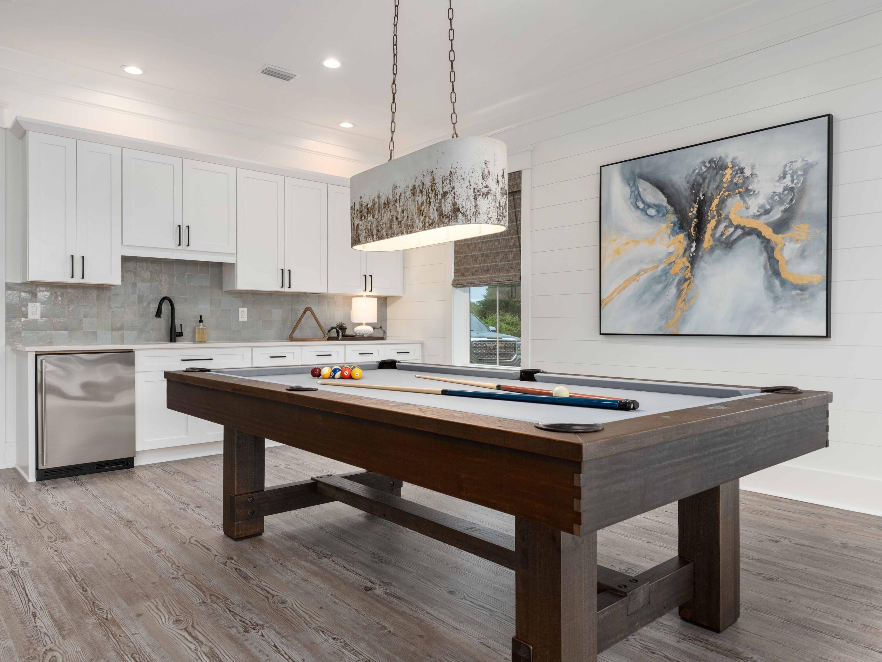 102 Overlook Circle Miramar Beach, FL 32550 - Photo 16 of 38 a room with a table chairs and wooden floor