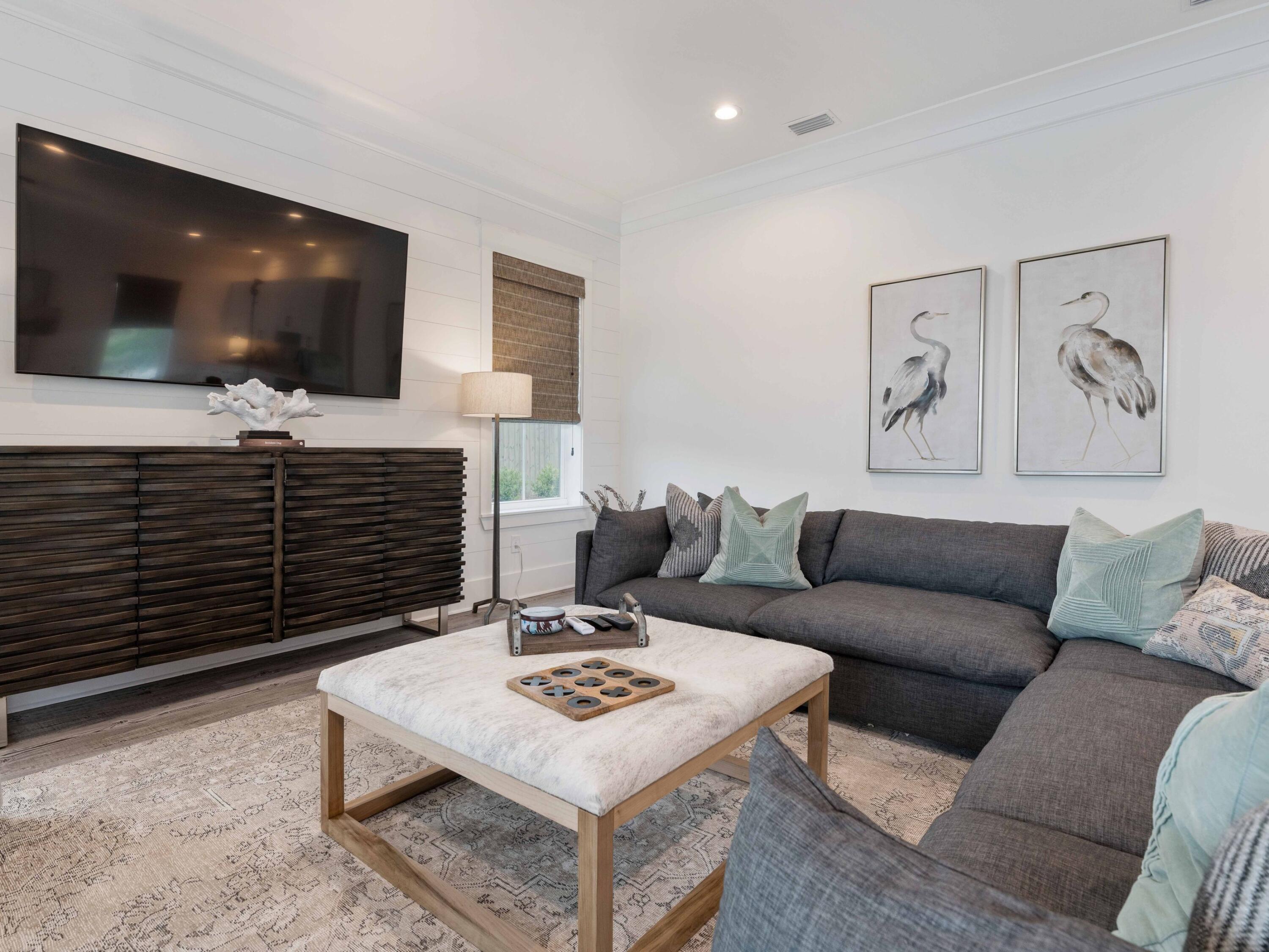 102 Overlook Circle Miramar Beach, FL 32550 - Photo 17 of 38 a living room with furniture and a flat screen tv