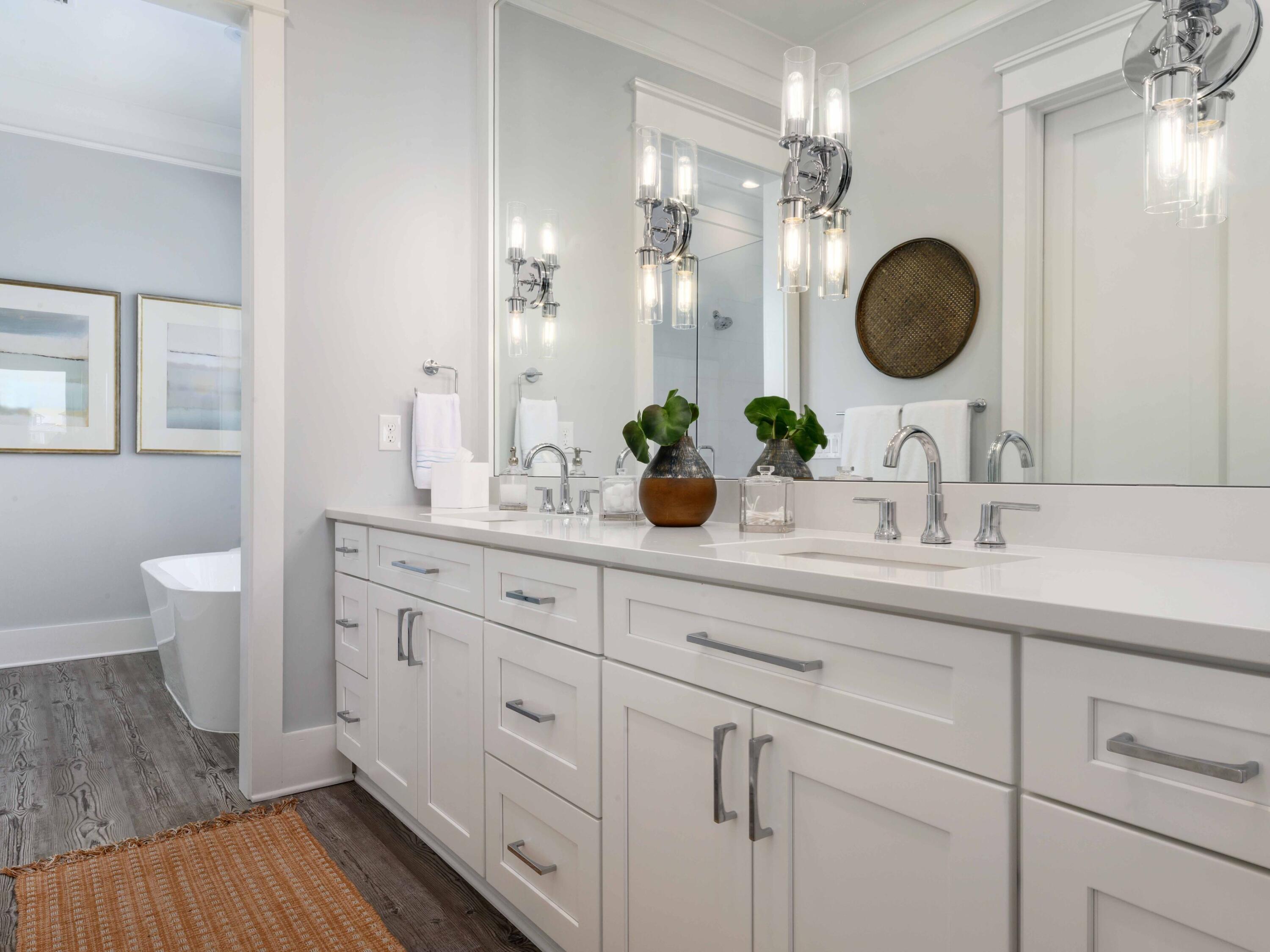 102 Overlook Circle Miramar Beach, FL 32550 - Photo 27 of 38 a bathroom with a double vanity sink and a mirror