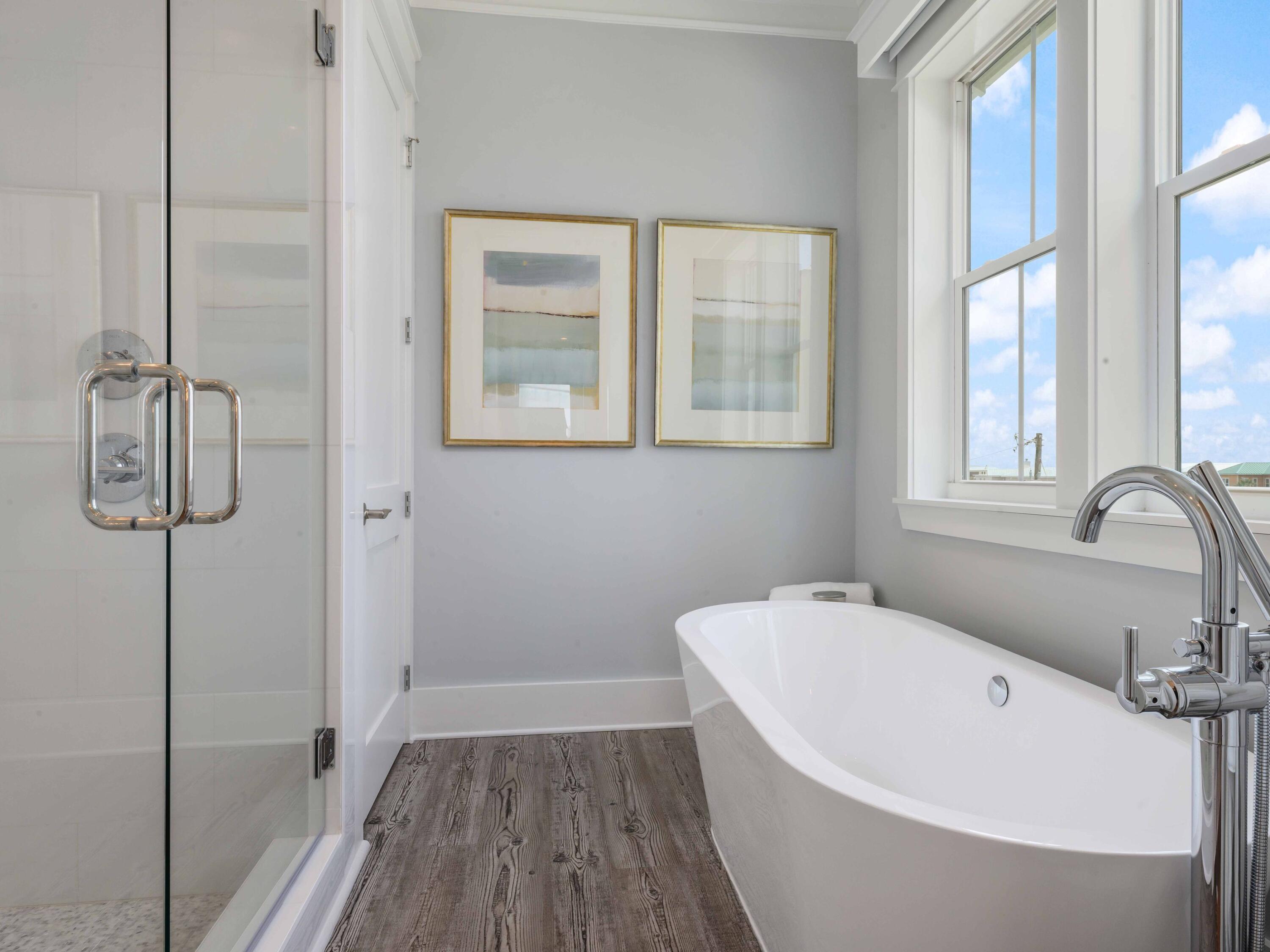 102 Overlook Circle Miramar Beach, FL 32550 - Photo 28 of 38 a white bath tub sitting next to a bathroom sink