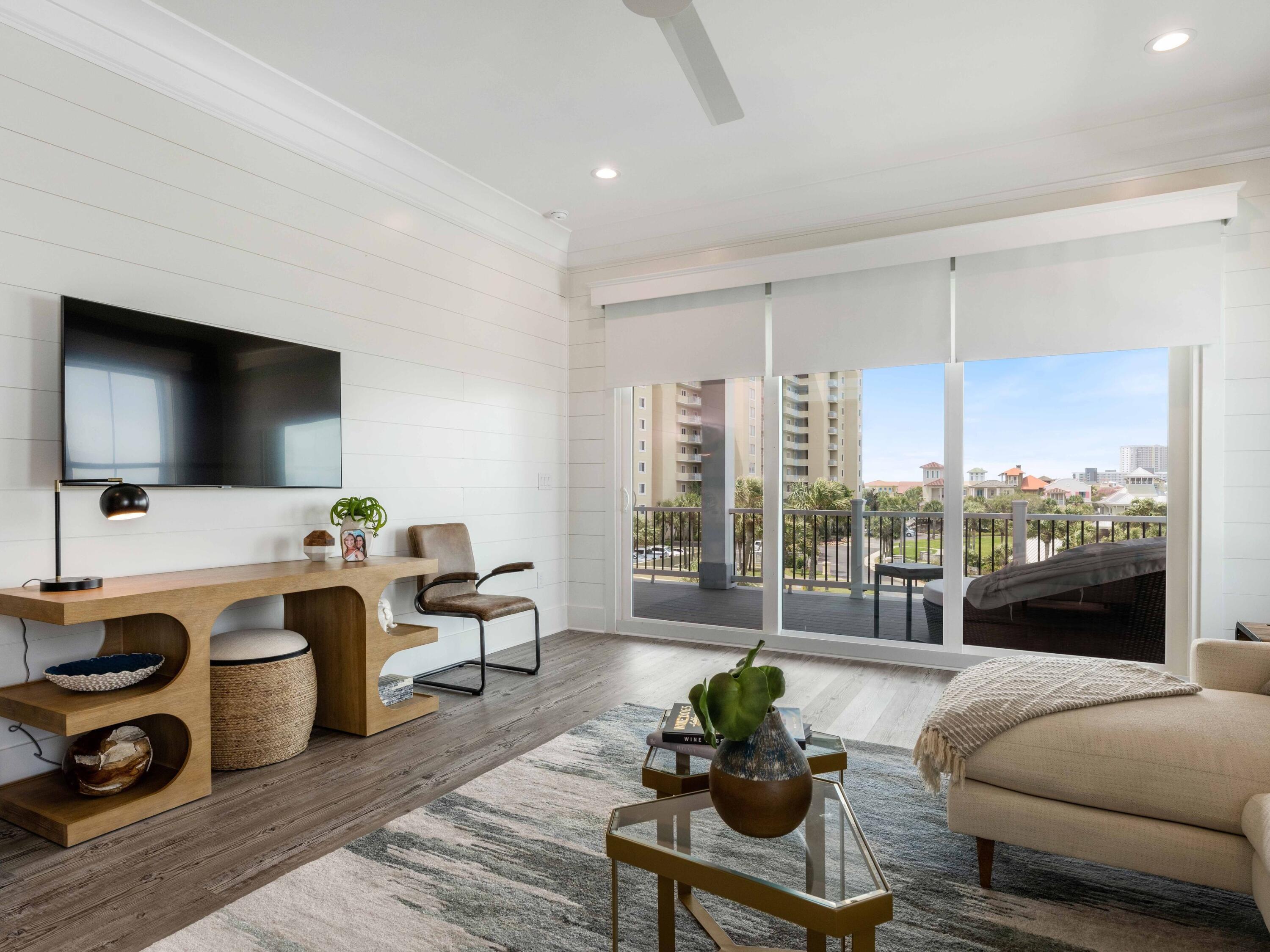 102 Overlook Circle Miramar Beach, FL 32550 - Photo 30 of 38 a living room with furniture and a flat screen tv