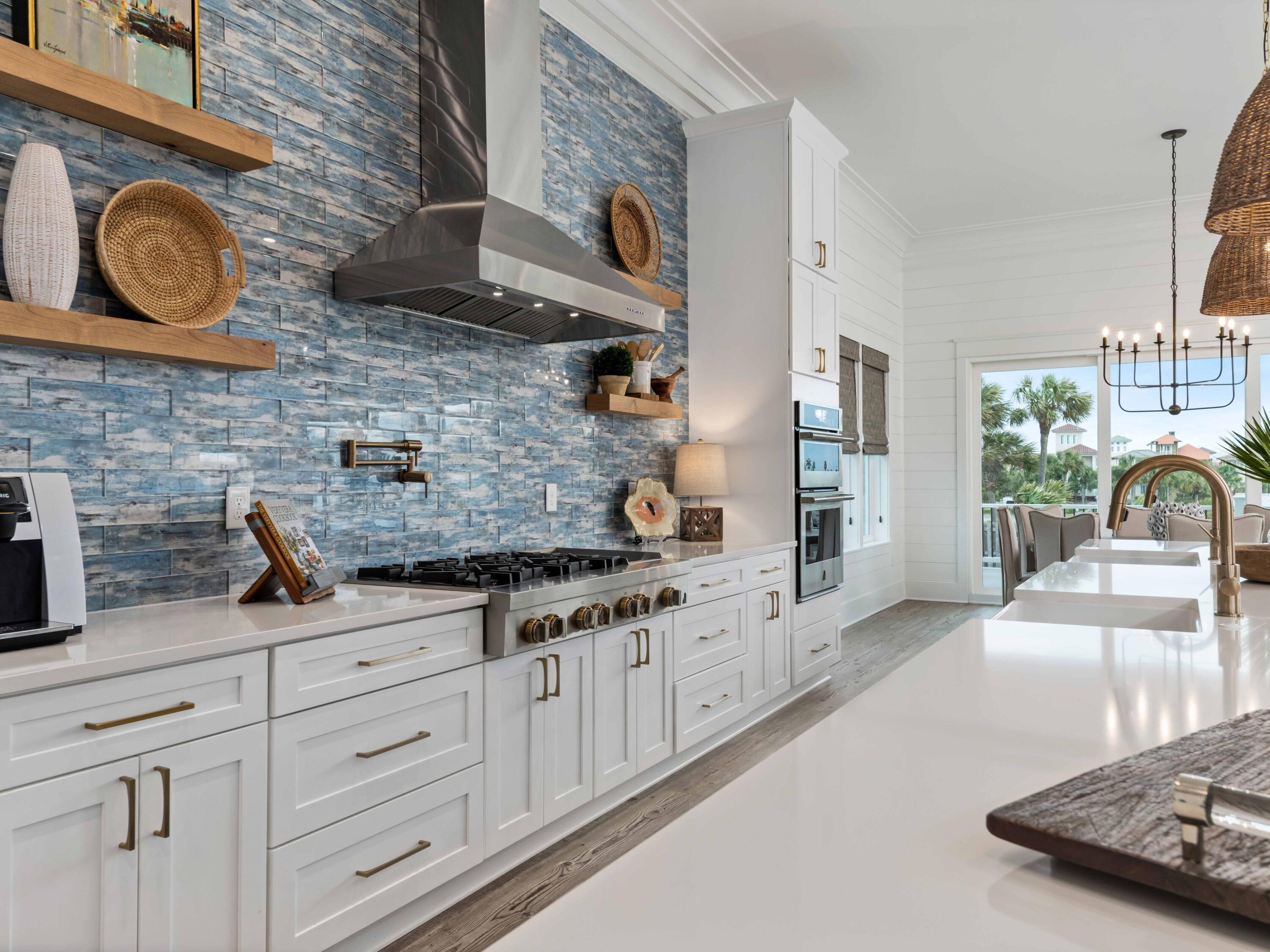 102 Overlook Circle Miramar Beach, FL 32550 - Photo 3 of 38 a kitchen with granite countertop a sink a stove and cabinets