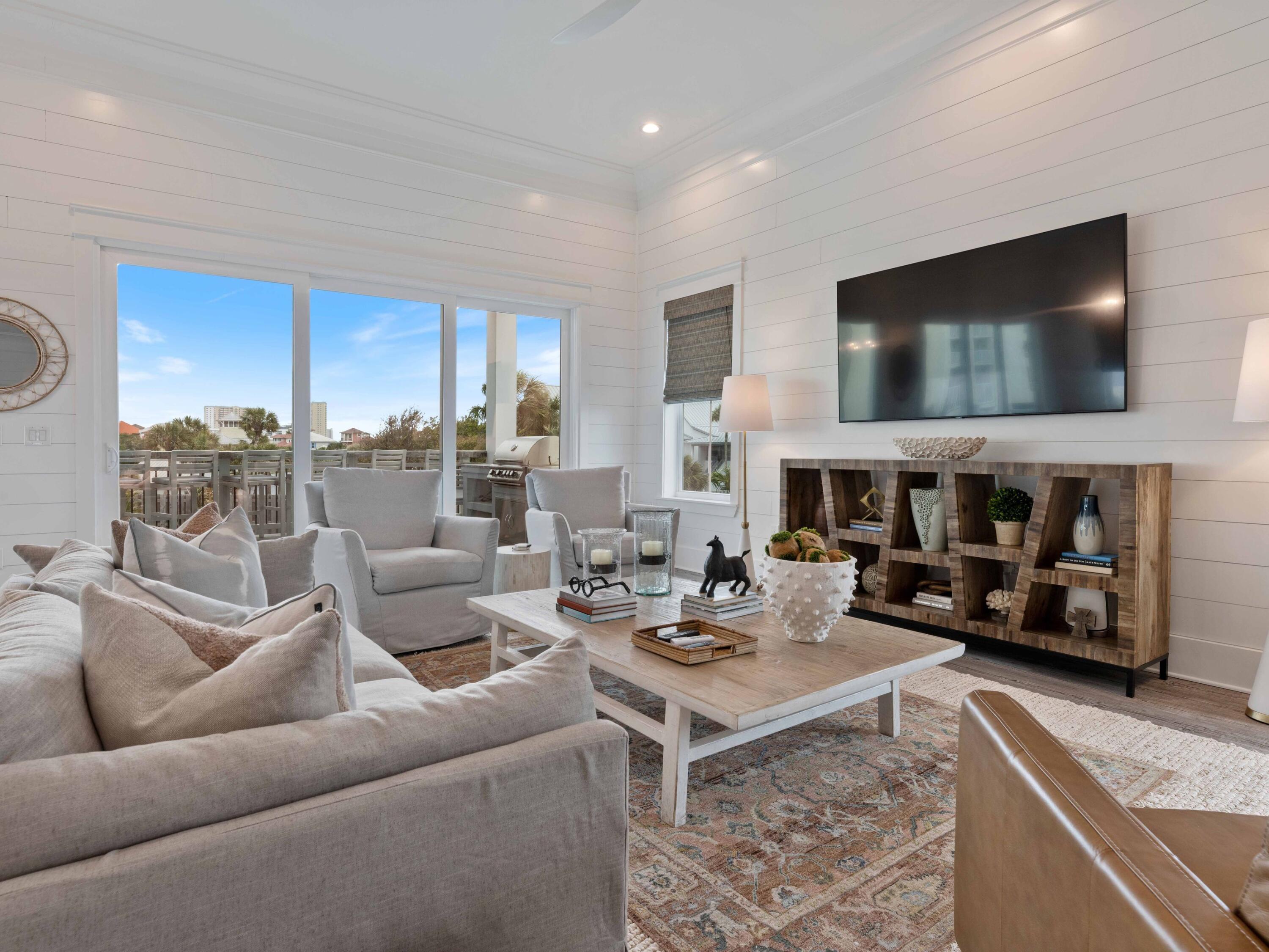 102 Overlook Circle Miramar Beach, FL 32550 - Photo 6 of 38 a living room with furniture and a flat screen tv