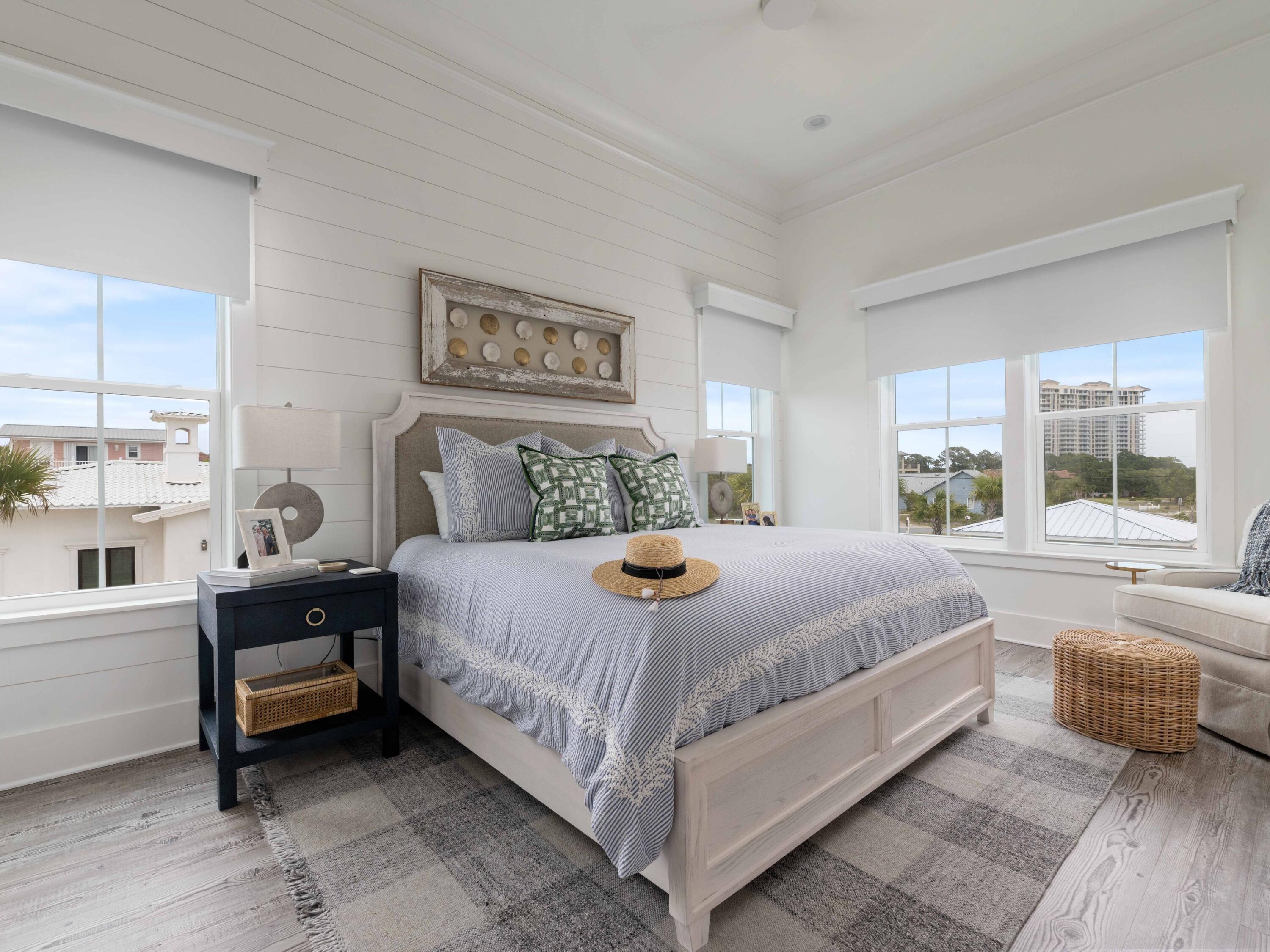 102 Overlook Circle Miramar Beach, FL 32550 - Photo 8 of 38 a bedroom with a bed and a large window