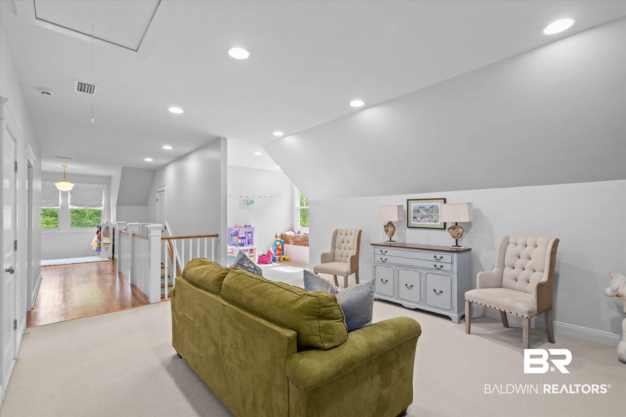 3813 Austill Lane Mobile, AL 36608 - Photo 16 of 37 Spacious room featuring sloped ceilings, recessed lighting, and soft carpeting