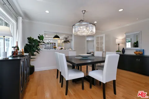 a kitchen with a stove and cabinets