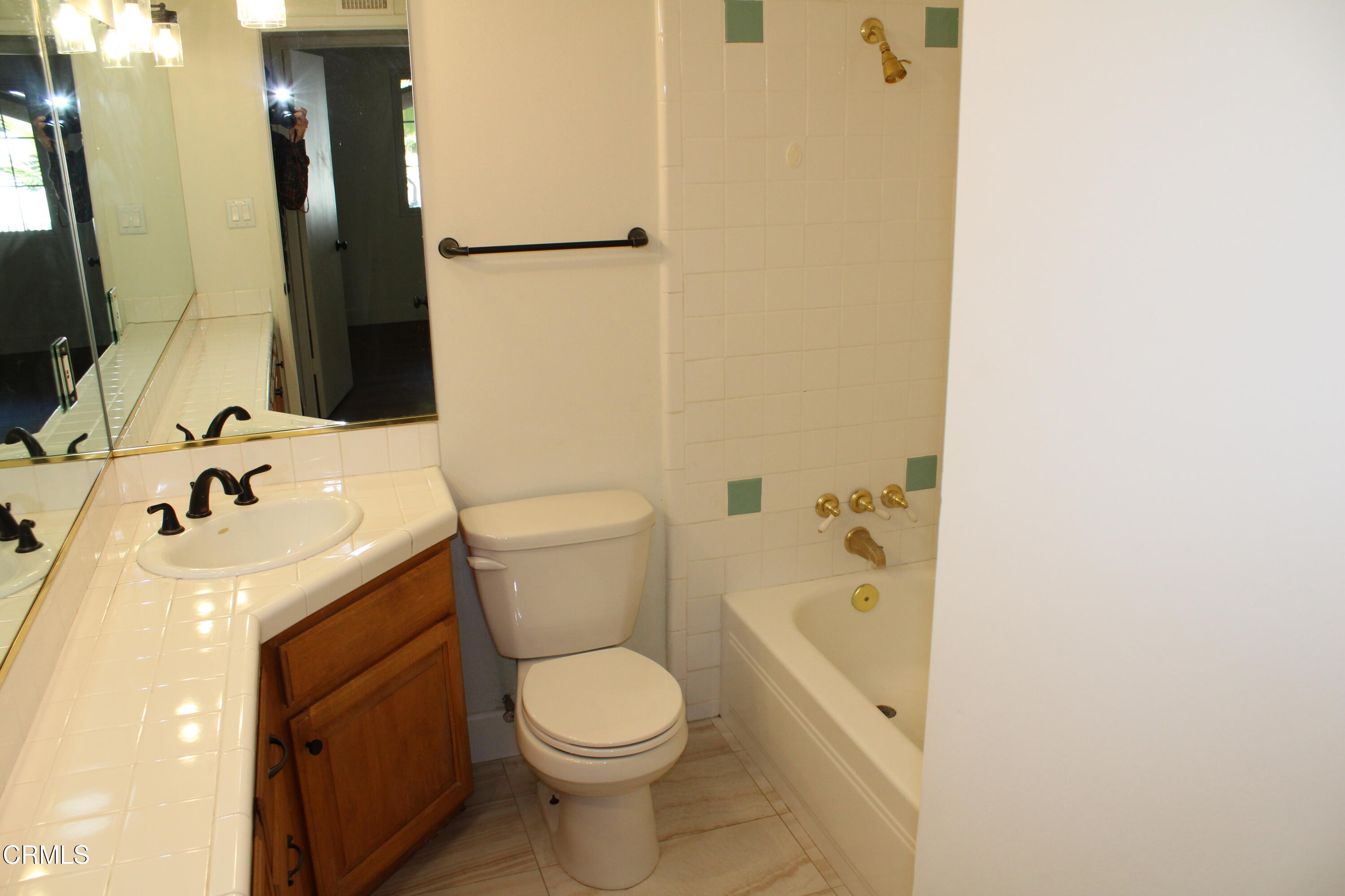 866 Cambon Circle Ojai, CA 93023 - Photo 11 of 27 a bathroom with a sink a toilet and shower