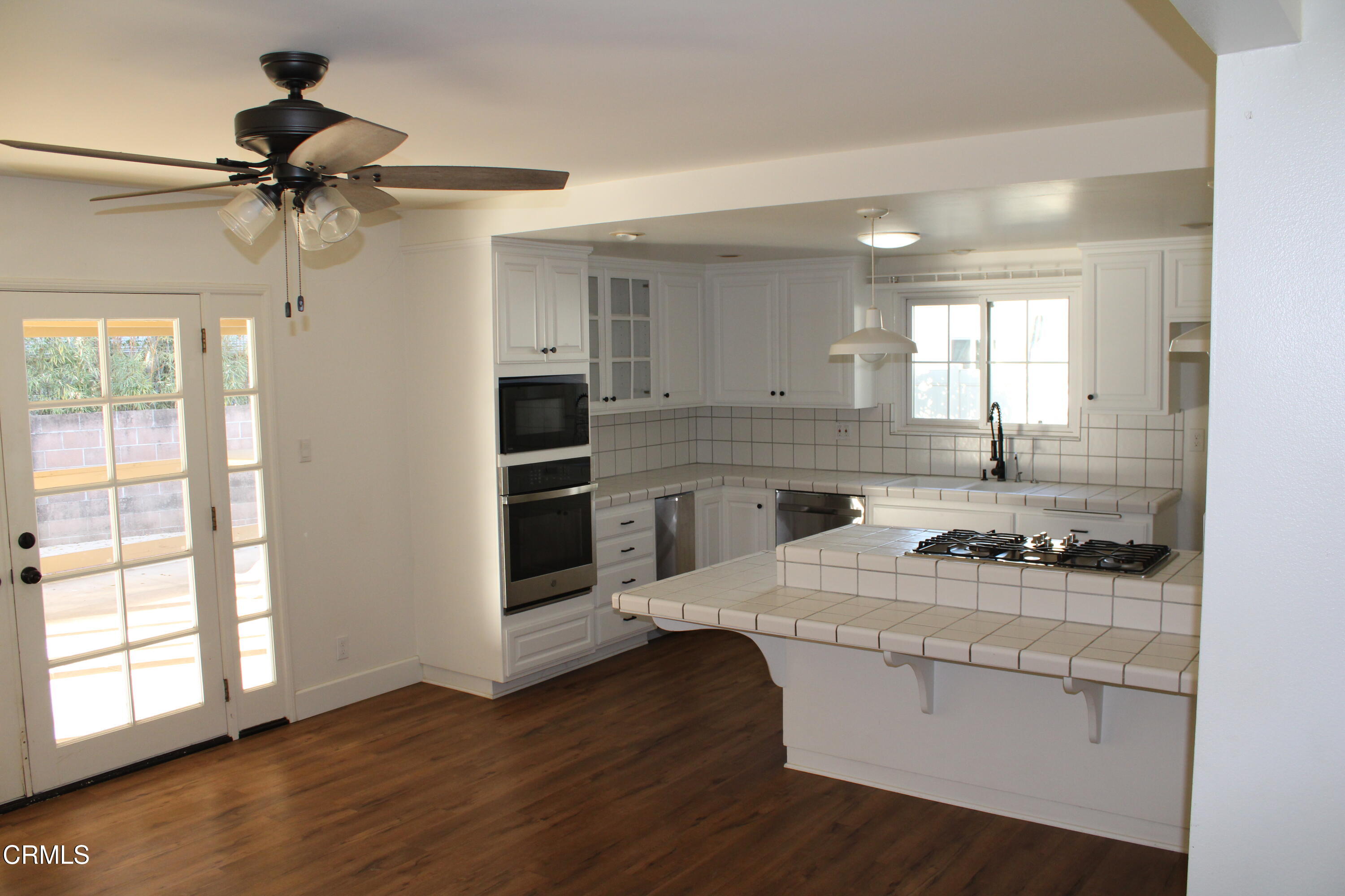 866 Cambon Circle Ojai, CA 93023 - Photo 5 of 27 a kitchen with a sink appliances and cabinets