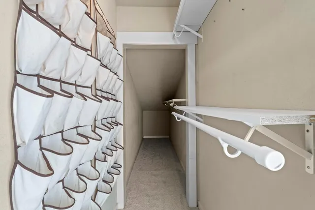 a view of an entryway with wooden floor