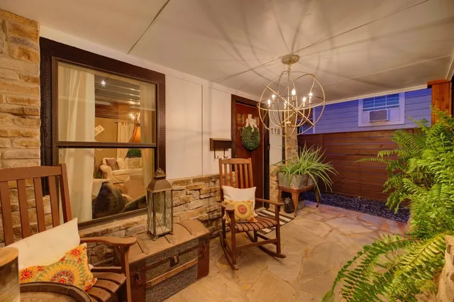 a view of a livingroom with furniture and window