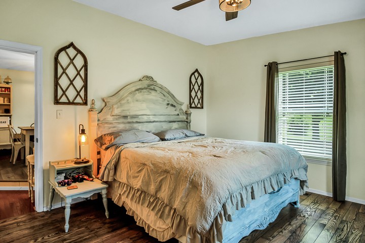 148 Thomas Road Livingston, TN 38570 - Photo 14 of 38 a bedroom with a bed and wooden floor