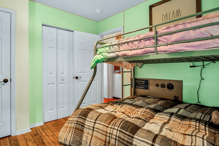 148 Thomas Road Livingston, TN 38570 - Photo 21 of 38 a bedroom with a bed and a chandelier