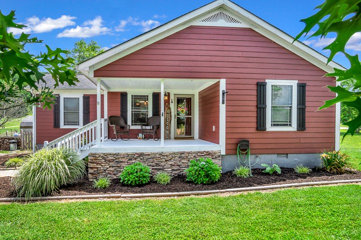 148 Thomas Road Livingston, TN 38570 - Photo 34 of 38 a front view of a house with a yard