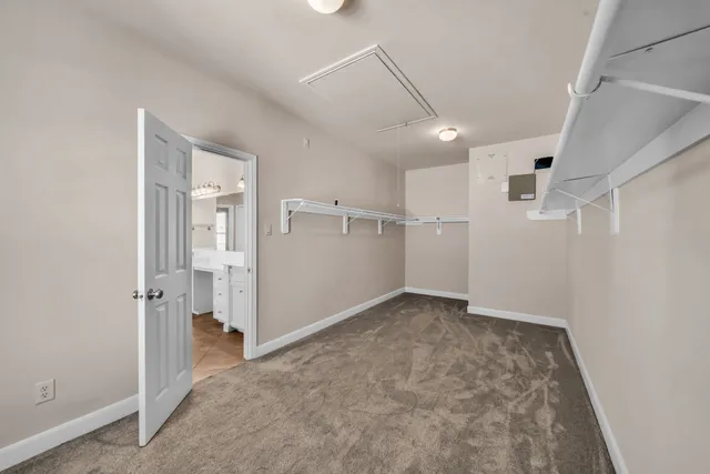 a view of a room that has a window