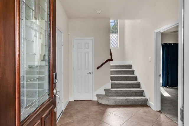 a view of entryway with a front door