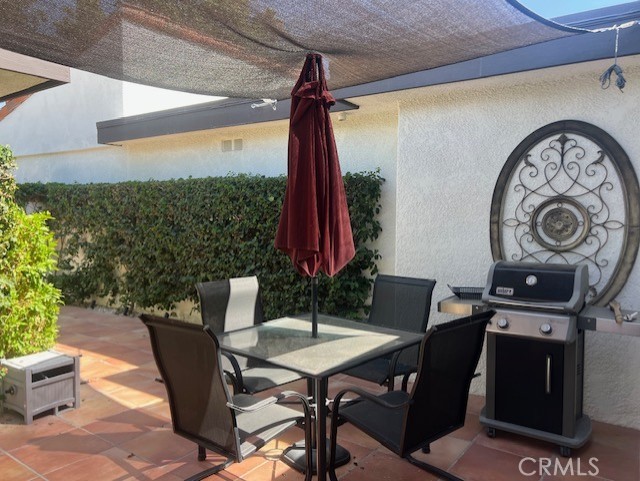36 El Toro Drive Rancho Mirage, CA 92270 - Photo 8 of 25 a view of a table and chairs in the patio