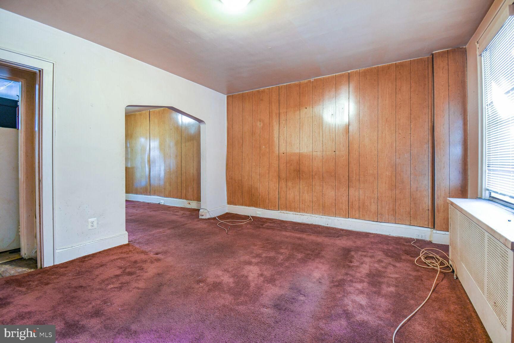 561 23rd Place Northeast Washington, DC 20002 - Photo 4 of 20 an empty room with windows and closet