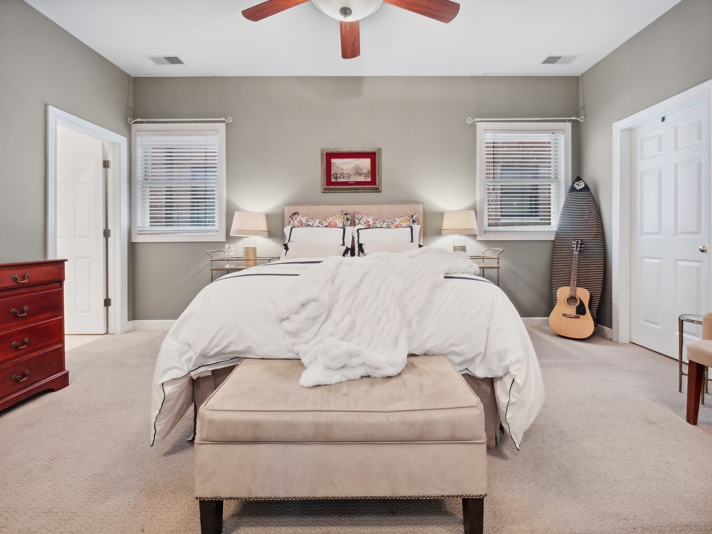 1827 West Addison Street, Unit 2 Chicago, IL 60613 - Photo 11 of 18 a large white bed in a bedroom next to a window