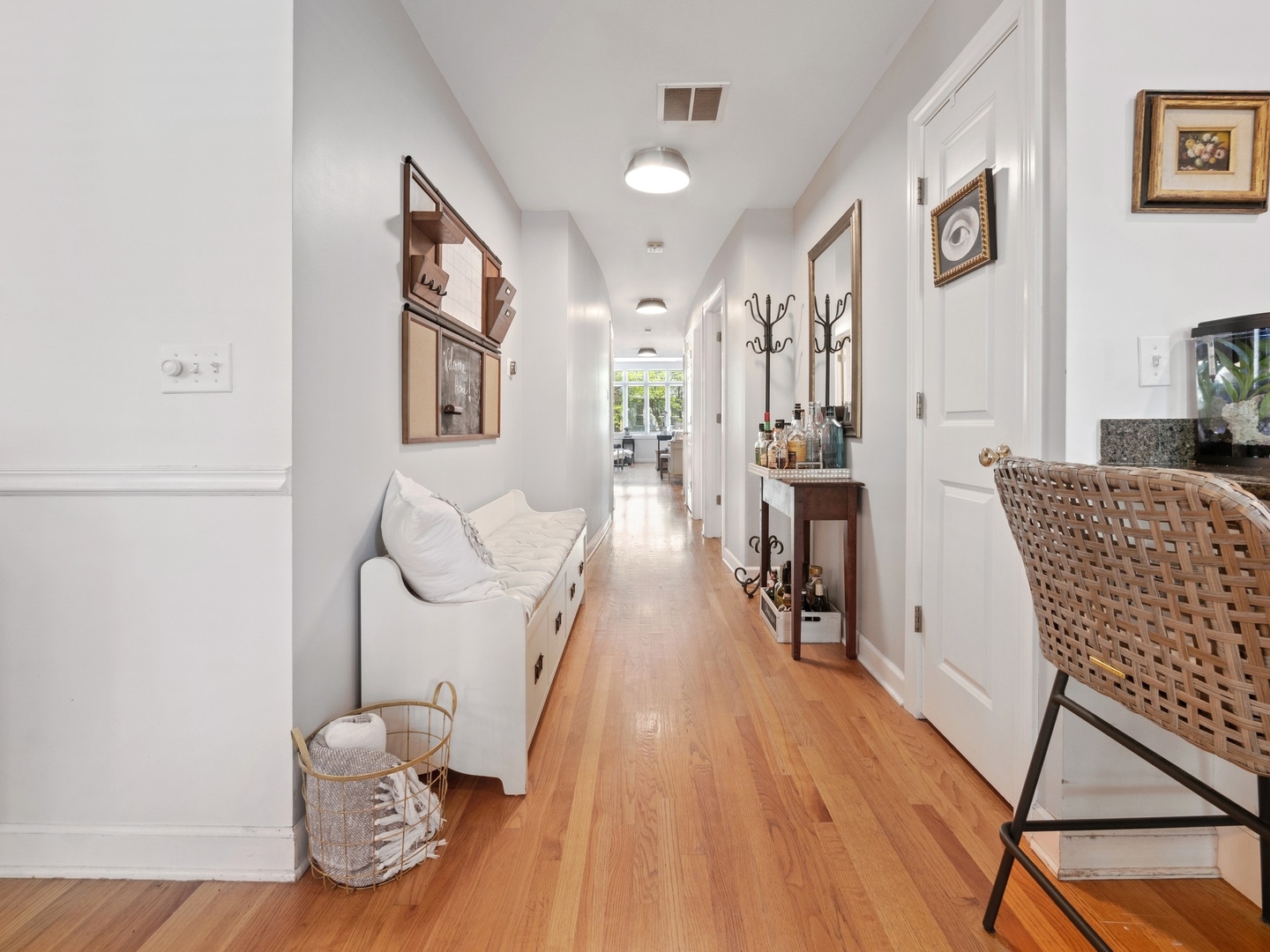 1827 West Addison Street, Unit 2 Chicago, IL 60613 - Photo 5 of 18 a living room with furniture and wooden floor