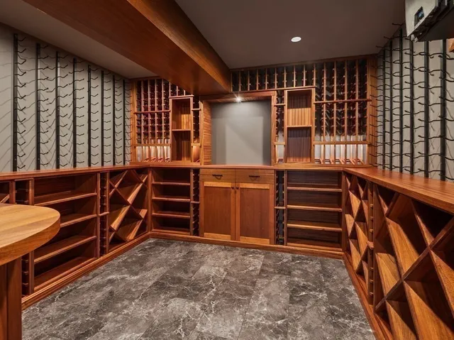 a view of an empty room with stairs