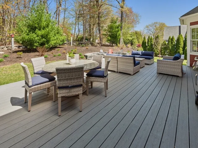 a outdoor space with patio couch and a potted plant