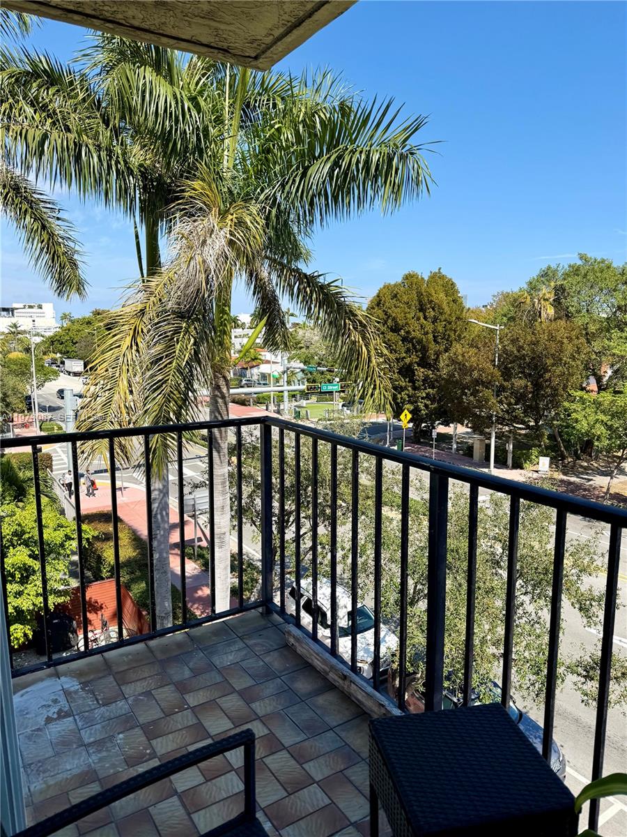 1236 Alton Road, Unit 401 Miami Beach, FL 33139 - Photo 6 of 14 a balcony with outdoor space