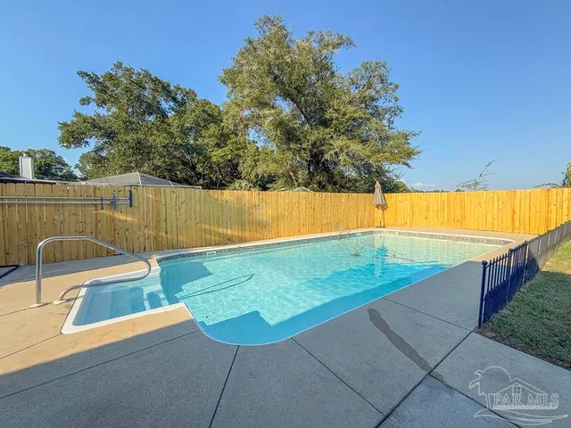 a view of backyard of house