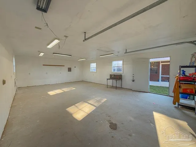 a house with trees in the background