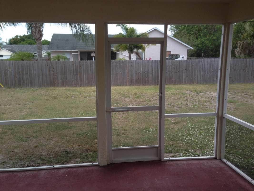 965 Southwest McCall Road Port St. Lucie, FL 34953 - Photo 4 of 8 Screened Porch