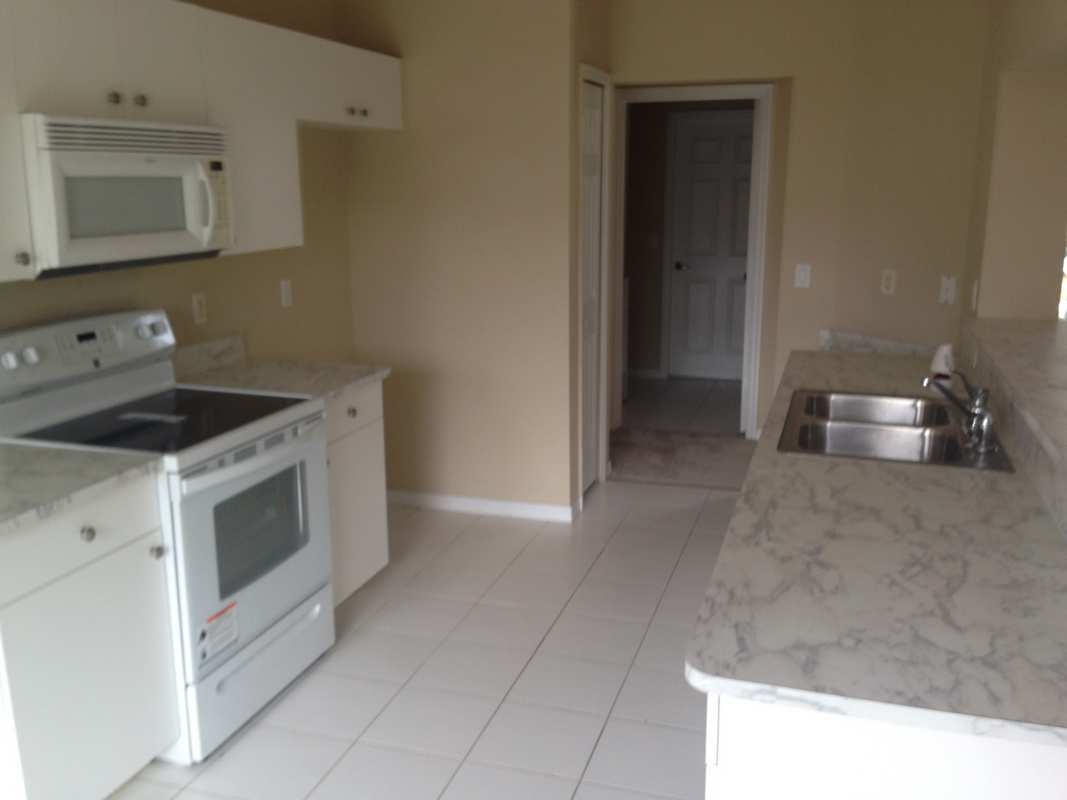 965 Southwest McCall Road Port St. Lucie, FL 34953 - Photo 8 of 8 Kitchen