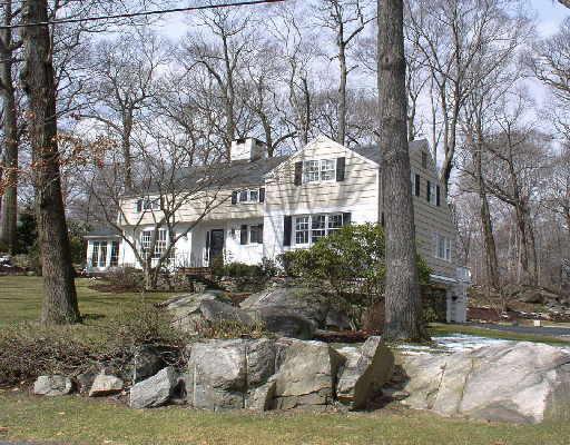 80 Winton Road Fairfield, CT 06824 - Photo 1 of 1 a front view of a house with a yard