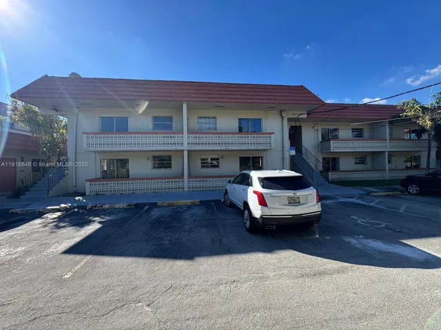 a car parked in front of a building