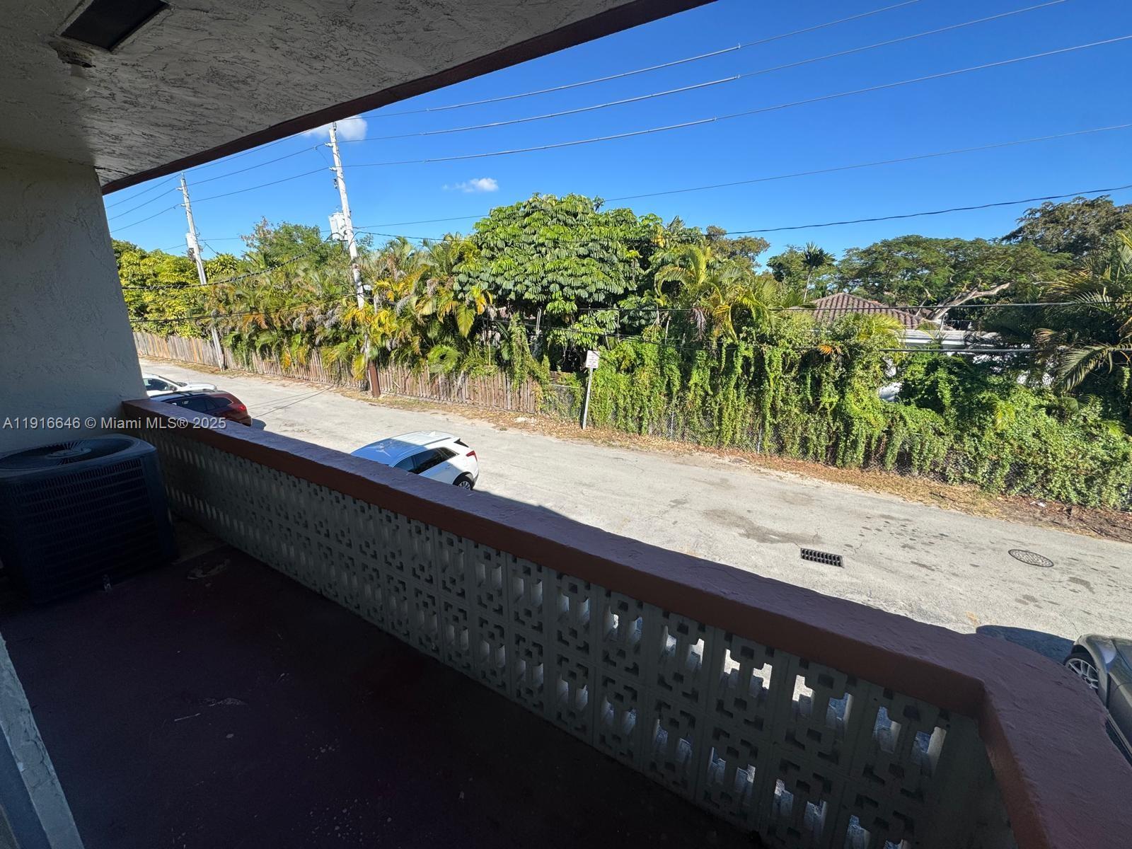 1825 Southwest 67th Avenue, Unit 24 West Miami, FL 33155 - Photo 8 of 11 a view of a street from a balcony