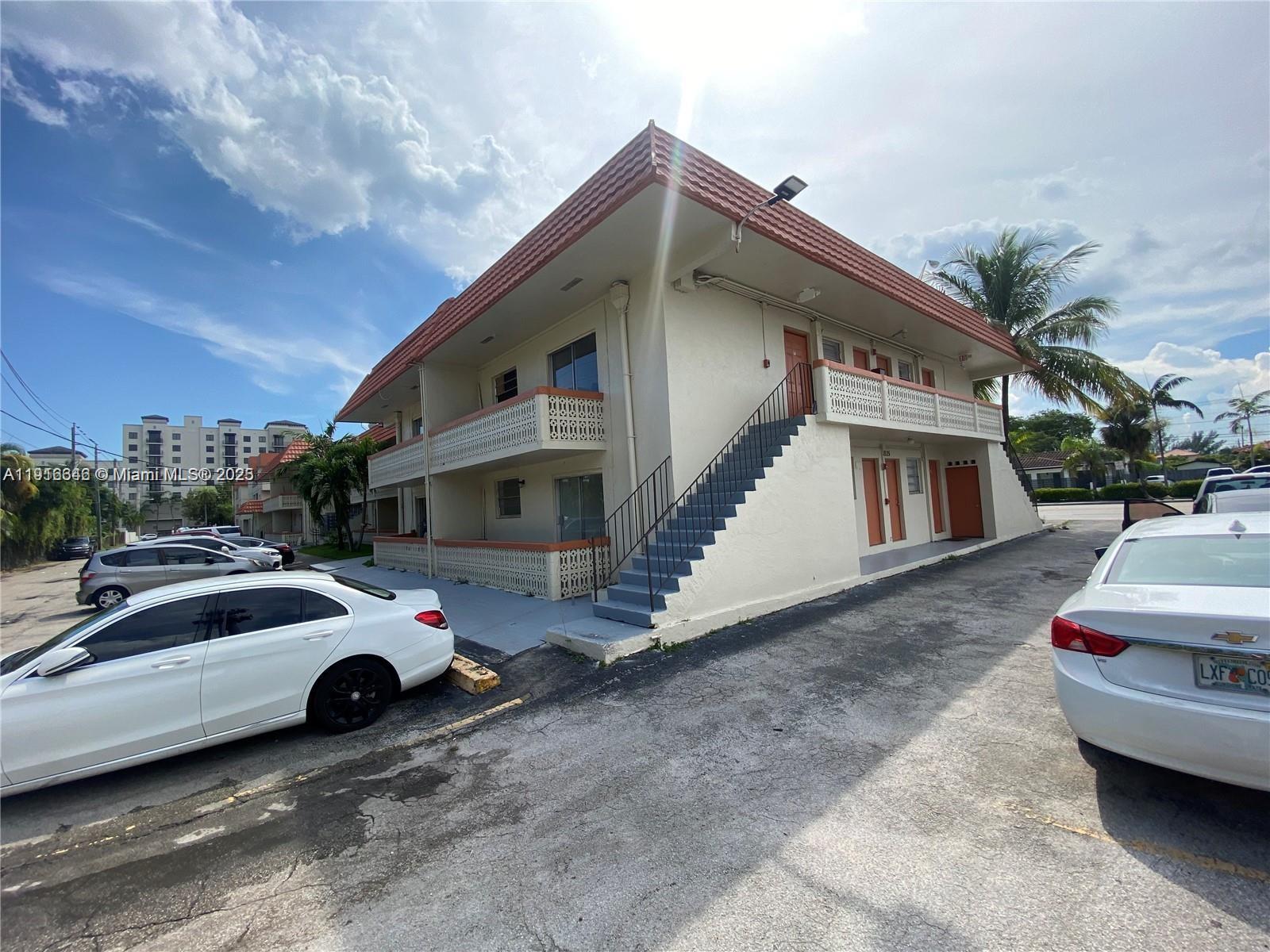 1825 Southwest 67th Avenue, Unit 24 West Miami, FL 33155 - Photo 9 of 11 a car parked in front of a house