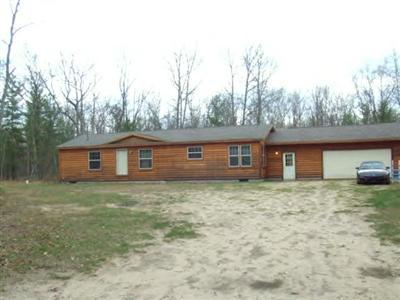 7731 6 Mile Bridge Road Manistee, MI 49660 - Photo 1 of 16 Primary Photo