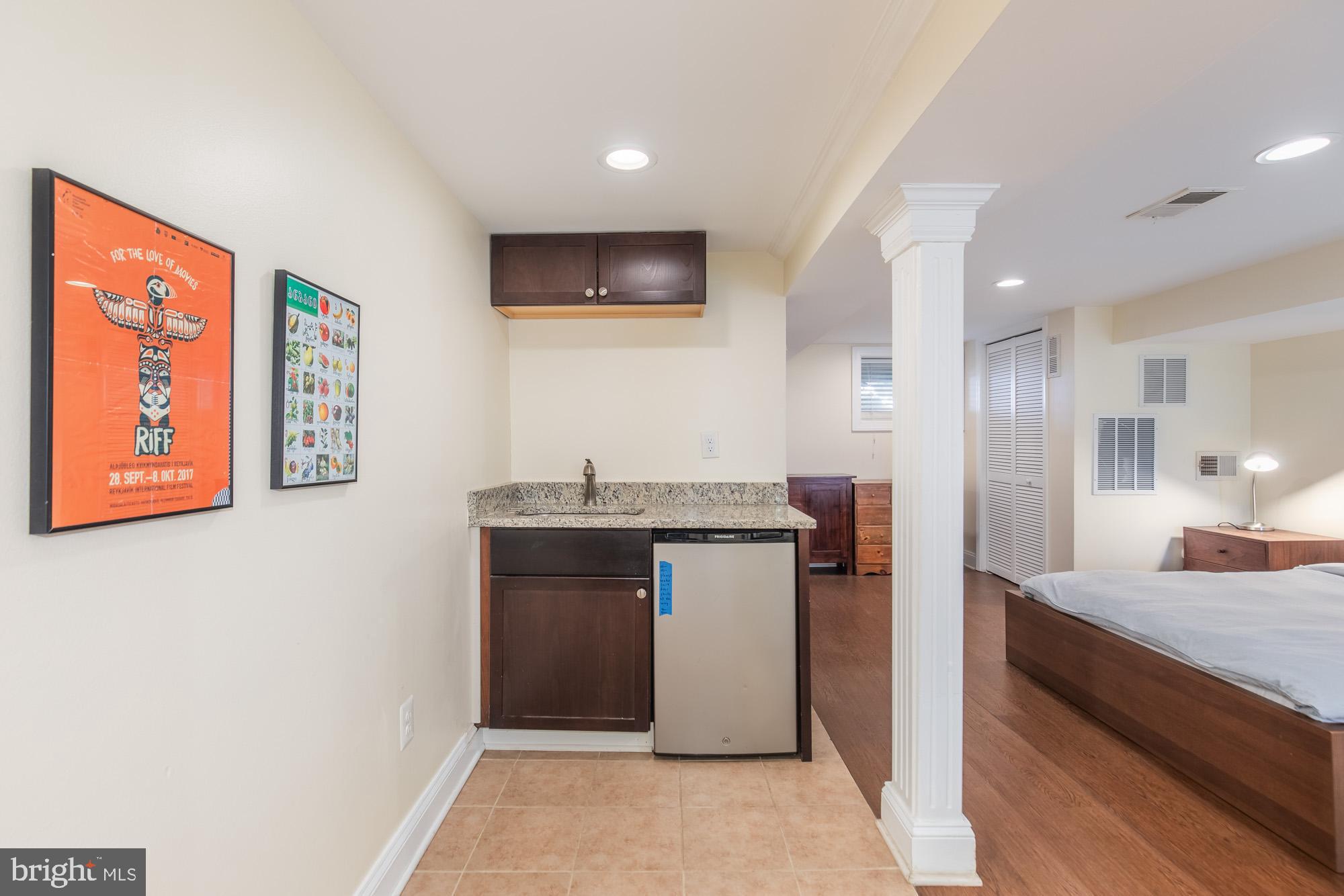 116 V Street Northeast Washington, DC 20002 - Photo 21 of 26 Convenient mini-fridge and sink for entertaining
